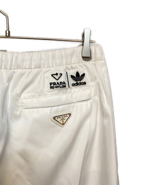 PRADA（プラダ）PRADA (プラダ) adidas (アディダス) Re nylonトラックパンツ ホワイト サイズ:Mの古着・服飾アイテム