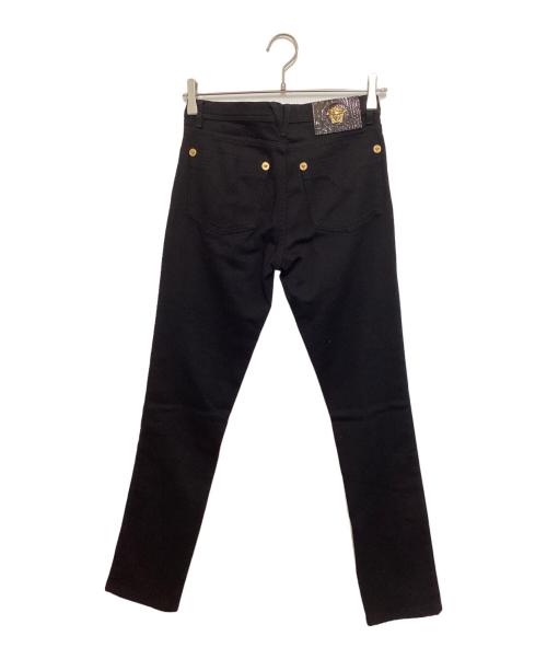 VERSACE（ヴェルサーチェ）VERSACE (ヴェルサーチェ) スタッズパンツ ブラック サイズ:W25の古着・服飾アイテム