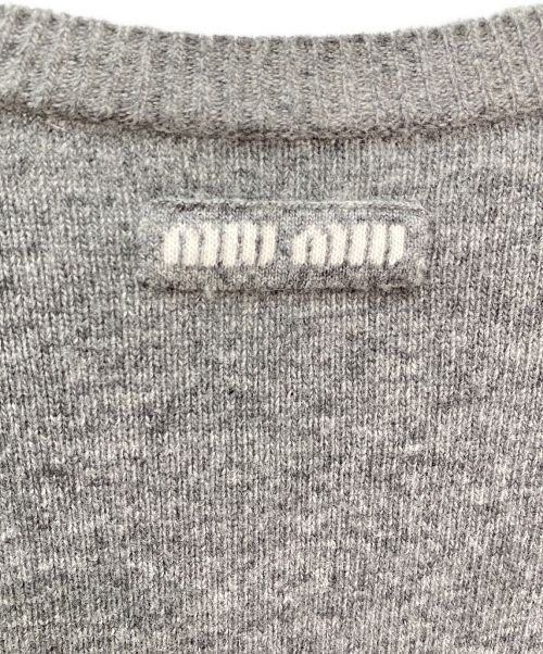 MIU MIU（ミュウミュウ）MIU MIU (ミュウミュウ) カットオフショート丈ニット グレー サイズ:40の古着・服飾アイテム