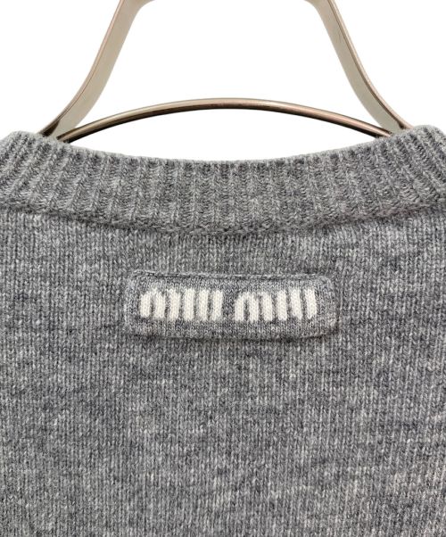 MIU MIU（ミュウミュウ）MIU MIU (ミュウミュウ) カットオフショート丈ニット グレー サイズ:36の古着・服飾アイテム