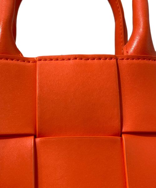 BOTTEGA VENETA（ボッテガベネタ）BOTTEGA VENETA (ボッテガベネタ) マキシイントレチャート ミニ カセット オレンジの古着・服飾アイテム