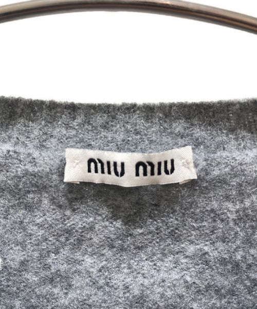 MIU MIU（ミュウミュウ）MIU MIU (ミュウミュウ) カットオフショート丈ニット グレー サイズ:36の古着・服飾アイテム