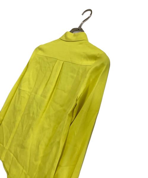 VERSUS（ヴェルサス）VERSUS (ヴェルサス) ボタン装飾ブラウス イエロー サイズ:36 未使用品の古着・服飾アイテム