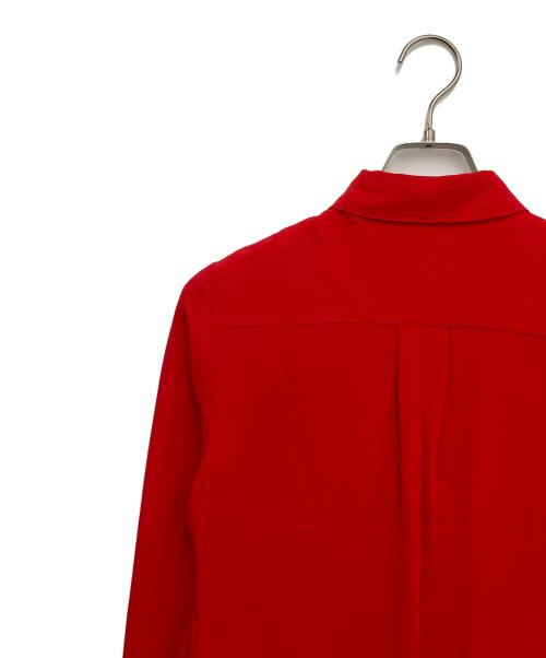 VERSUS（ヴェルサス）VERSUS (ヴェルサス) ボタン装飾ブラウス レッド サイズ:36の古着・服飾アイテム