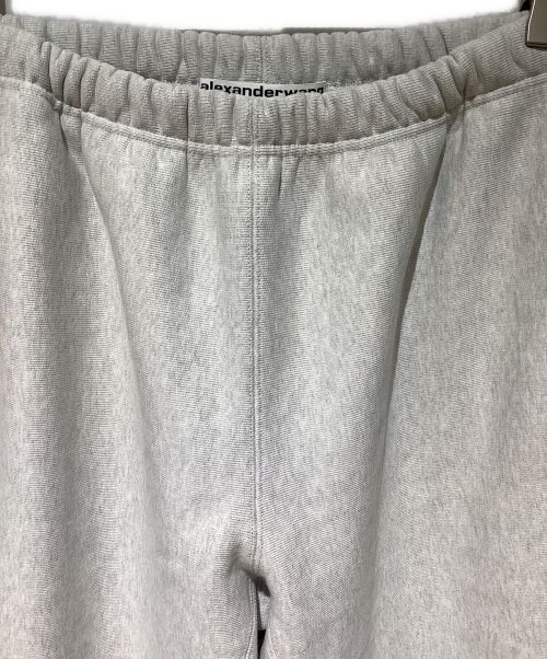 ALEXANDER WANG（アレキサンダー・ワン）ALEXANDER WANG (アレキサンダーワン) Logo Embossed Straight Track Pants（ロゴエンボスストレートトラックパンツ） ライトグレー サイズ:Mの古着・服飾アイテム
