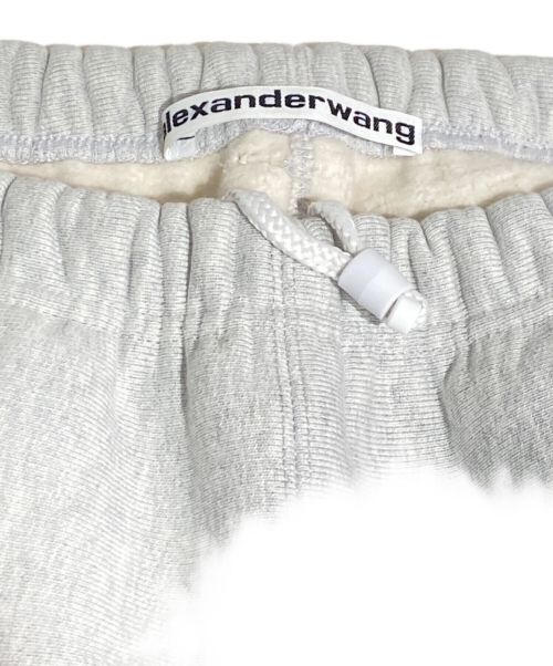 ALEXANDER WANG（アレキサンダー・ワン）ALEXANDER WANG (アレキサンダーワン) Logo Embossed Straight Track Pants（ロゴエンボスストレートトラックパンツ） ライトグレー サイズ:Mの古着・服飾アイテム