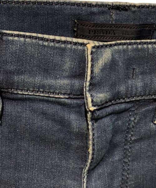 PRADA（プラダ）PRADA (プラダ) 三角プレートストレッチデニムパンツ インディゴ サイズ:26の古着・服飾アイテム