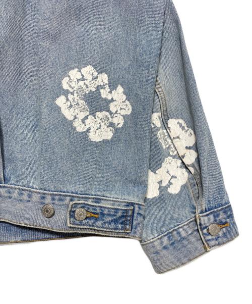 Denim Tears（デニムティアーズ）Denim Tears (デニムティアーズ) LEVI'S (リーバイス) オールオーバーリース ライトウォッシュ デニムトラッカージャケット スカイブルー サイズ:XXLの古着・服飾アイテム