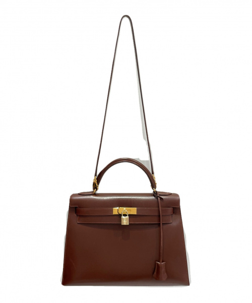 HERMES（エルメス）HERMES (エルメス) ケリー32 ブラウン サイズ:32 ボックスカーフ　外縫い　ゴールド金具　□B刻印の古着・服飾アイテム