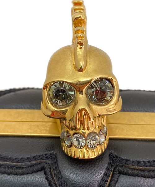 ALEXANDER McQUEEN（アレキサンダーマックイーン）ALEXANDER McQUEEN (アレキサンダーマックイーン) スカルクラッチバッグ ブラックの古着・服飾アイテム
