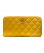 CHANELシャネル）の古着「ココマークラウンドファスナーウォレット」｜イエロー