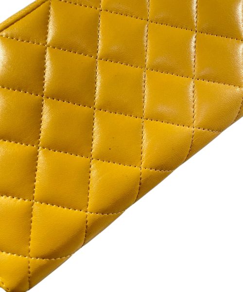 CHANEL（シャネル）CHANEL (シャネル) ココマークラウンドファスナーウォレット イエローの古着・服飾アイテム