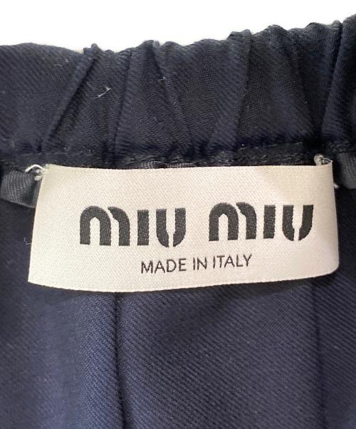MIU MIU（ミュウミュウ）MIU MIU (ミュウミュウ) プリーツ バタヴィア スカート ネイビー サイズ:36の古着・服飾アイテム