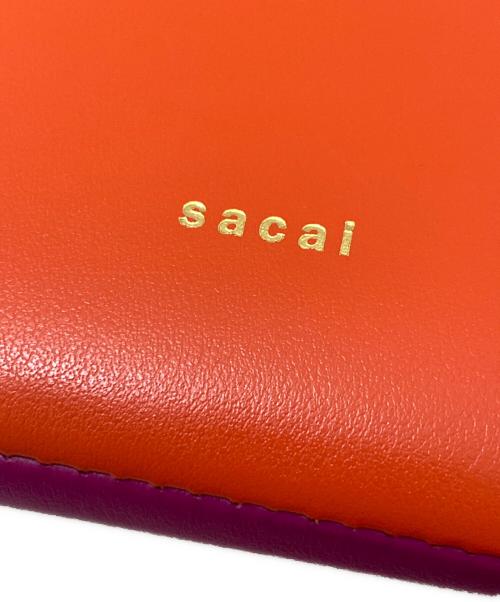 sacai（サカイ）sacai (サカイ) Bicolor Mobile Pouch オレンジ×パープルの古着・服飾アイテム