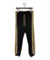 GUCCI（グッチ）の古着「logo tape-trim track pants」｜ブラック