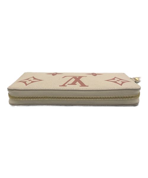 LOUIS VUITTON（ルイ ヴィトン）LOUIS VUITTON (ルイ ヴィトン) ジッピー・ウォレット  ベージュ×ピンクの古着・服飾アイテム