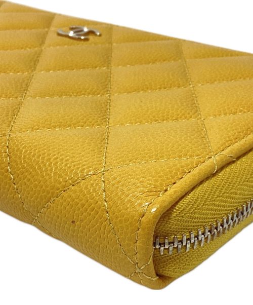 CHANEL（シャネル）CHANEL (シャネル) キャビアスキンラウンドファスナー財布 イエローの古着・服飾アイテム