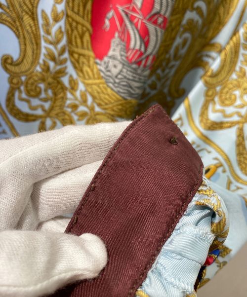 HERMES（エルメス）HERMES (エルメス) セリエボタン シルク 総柄 ブラウス スカイブルー サイズ:38の古着・服飾アイテム