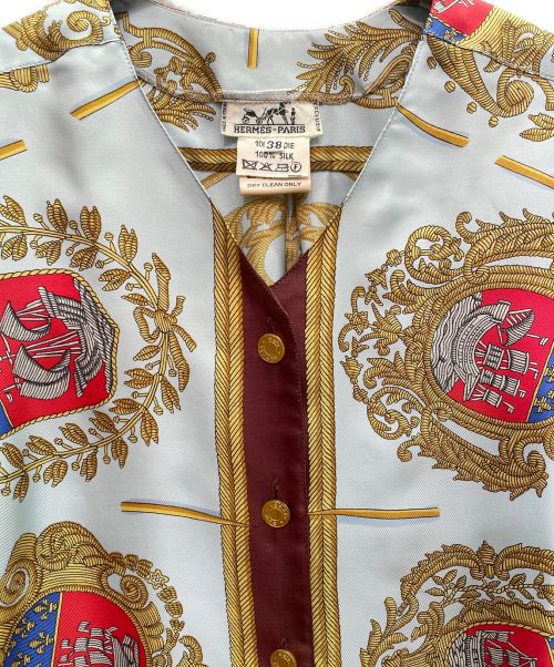 HERMES（エルメス）HERMES (エルメス) セリエボタン シルク 総柄 ブラウス スカイブルー サイズ:38の古着・服飾アイテム