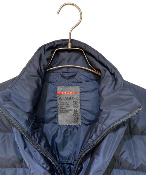 PRADA SPORTS（プラダスポーツ）PRADA SPORTS (プラダスポーツ) Down jacket with triangle logo（トライアングルロゴ付ダウンジャケット） ネイビー サイズ:46の古着・服飾アイテム