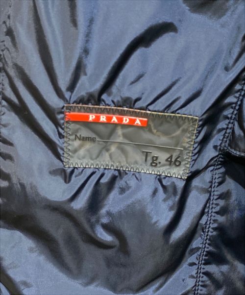 PRADA SPORTS（プラダスポーツ）PRADA SPORTS (プラダスポーツ) Down jacket with triangle logo（トライアングルロゴ付ダウンジャケット） ネイビー サイズ:46の古着・服飾アイテム