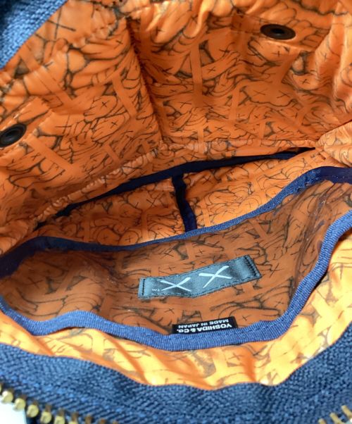 PORTER（ポーター）PORTER (ポーター) KAWS (カウズ) Nylon 2way Bag （ナイロン2WAYバッグ） ネイビーの古着・服飾アイテム