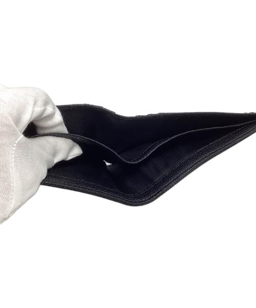 EMPORIO ARMANI（エンポリオアルマーニ）EMPORIO ARMANI (エンポリオアルマーニ) 2つ折り財布 ブラックの古着・服飾アイテム