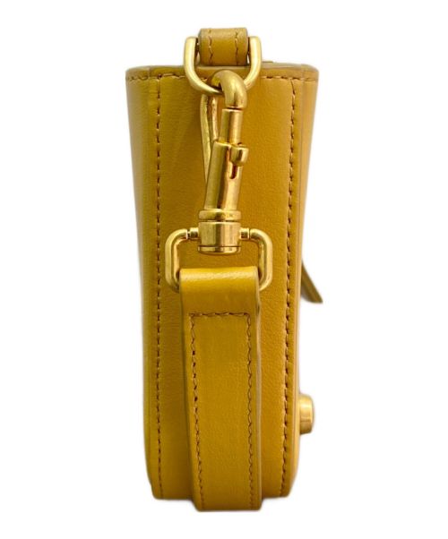 TOD'S（トッズ）TOD'S (トッズ) レザースマートフォンケース マスタードの古着・服飾アイテム
