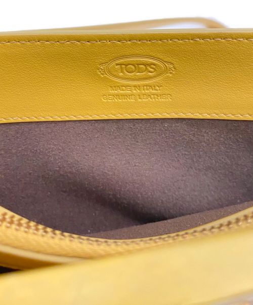 TOD'S（トッズ）TOD'S (トッズ) レザースマートフォンケース マスタードの古着・服飾アイテム
