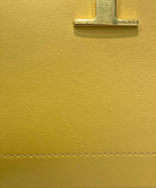 TOD'S（トッズ）TOD'S (トッズ) レザースマートフォンケース マスタードの古着・服飾アイテム