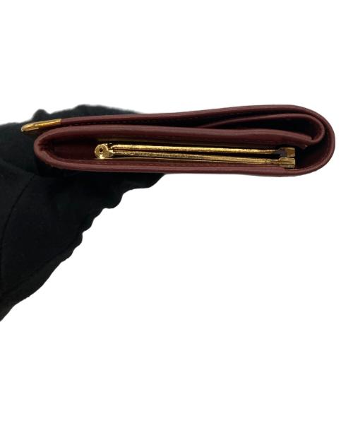 Cartier（カルティエ）Cartier (カルティエ) がま口長財布 ボルドーの古着・服飾アイテム