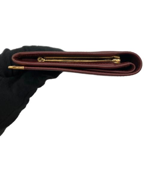 Cartier（カルティエ）Cartier (カルティエ) がま口長財布 ボルドーの古着・服飾アイテム