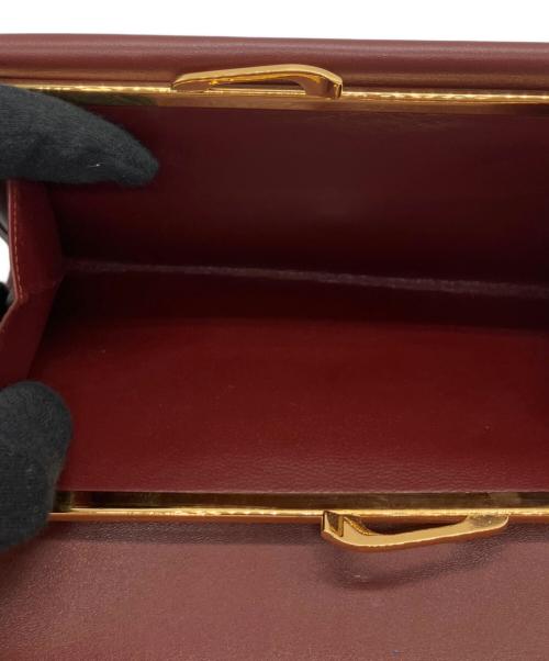 Cartier（カルティエ）Cartier (カルティエ) がま口長財布 ボルドーの古着・服飾アイテム