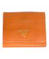 PRADA（プラダ）の古着「コンパクトウォレット」｜オレンジ
