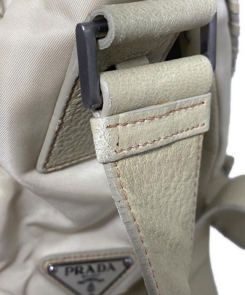 PRADA（プラダ）PRADA (プラダ) パンチングショルダーバッグ ベージュの古着・服飾アイテム