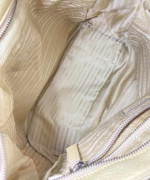 PRADA（プラダ）PRADA (プラダ) パンチングショルダーバッグ ベージュの古着・服飾アイテム