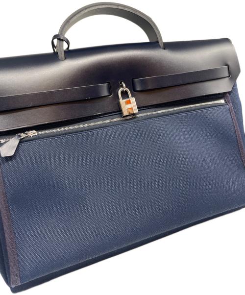 HERMES（エルメス）HERMES (エルメス) エールバッグジップ PM/シルバー金具/トワルオフィシエ×レザー/B刻印/2023年 ネイビー サイズ:PMの古着・服飾アイテム
