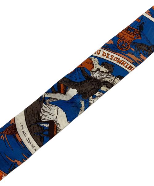 HERMES（エルメス）HERMES (エルメス) ツィリー オムニバスと白い貴婦人のゲーム ブルー×オレンジの古着・服飾アイテム