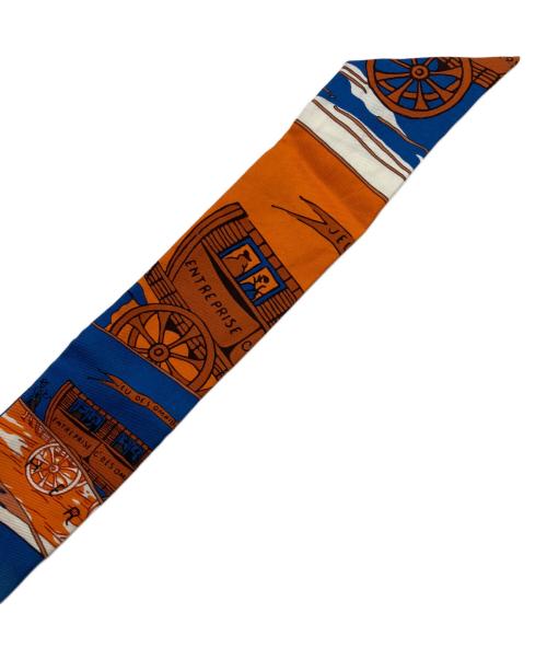 HERMES（エルメス）HERMES (エルメス) ツィリー オムニバスと白い貴婦人のゲーム ブルー×オレンジの古着・服飾アイテム