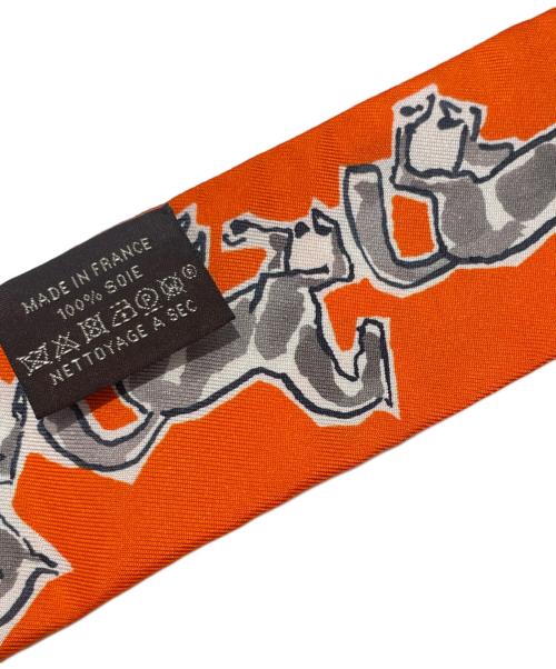 HERMES（エルメス）HERMES (エルメス) ツィリーchevaux en liberte 自由の馬 オレンジの古着・服飾アイテム