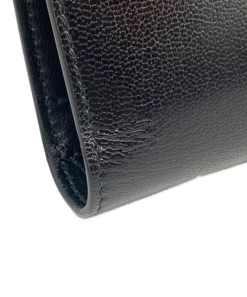 THE ROW（ザ ロウ）THE ROW (ザ ロウ) 3つ折り カーフ 財布 ブラックの古着・服飾アイテム