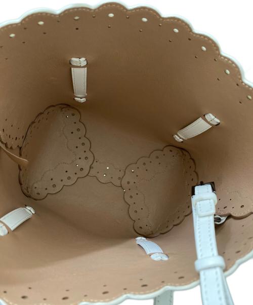 ALAIA（アライア）ALAIA (アライア) パンチングハンドバッグ ホワイトの古着・服飾アイテム