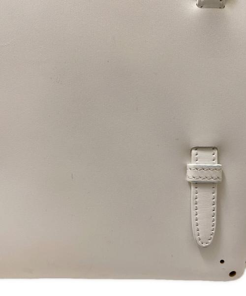 ALAIA（アライア）ALAIA (アライア) パンチングハンドバッグ ホワイトの古着・服飾アイテム