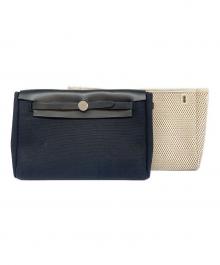 HERMES（エルメス）の古着「エールバッグクラッチ」｜ブラック×アイボリー