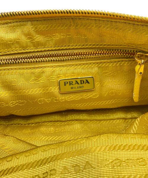 PRADA（プラダ）PRADA (プラダ) トライアングルロゴキャンバスポーチ イエローの古着・服飾アイテム