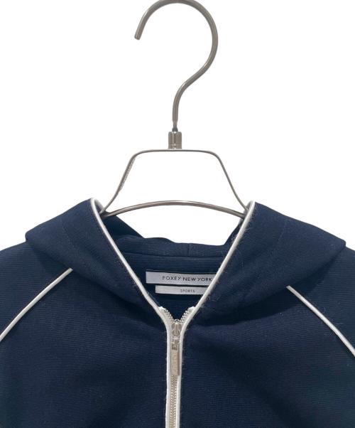 FOXEY NEW YORK SPORTS（フォクシー ニューヨーク スポーツ）FOXEY NEW YORK SPORTS (フォクシー ニューヨーク スポーツ) ショート丈ジップパーカー ネイビー サイズ:38の古着・服飾アイテム