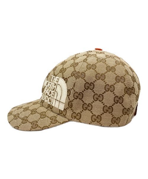 GUCCI（グッチ）GUCCI (グッチ) THE NORTH FACE (ザ ノース フェイス) GGベースボールキャップ ベージュ×オレンジ サイズ:Mの古着・服飾アイテム