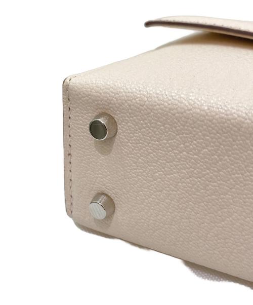 HERMES（エルメス）HERMES (エルメス) ヴェルーミニストラップバッグ アイボリー×オレンジの古着・服飾アイテム