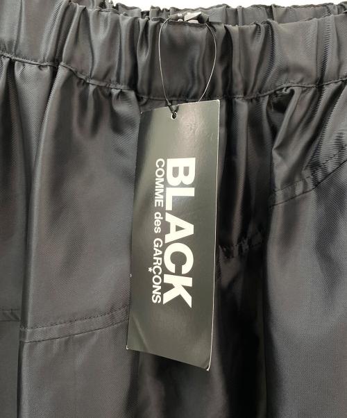BLACK COMME des GARCONS（ブラックコムデギャルソン）BLACK COMME des GARCONS (ブラックコムデギャルソン) カットオフティアードスカート ブラック サイズ:XSの古着・服飾アイテム