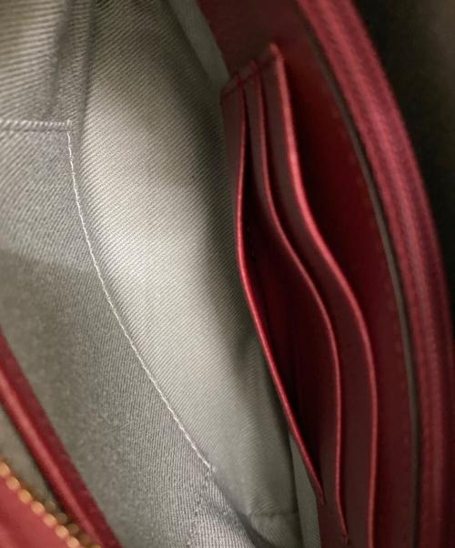 Cartier（カルティエ）Cartier (カルティエ) C ドゥ カルティエポーチ レッドの古着・服飾アイテム
